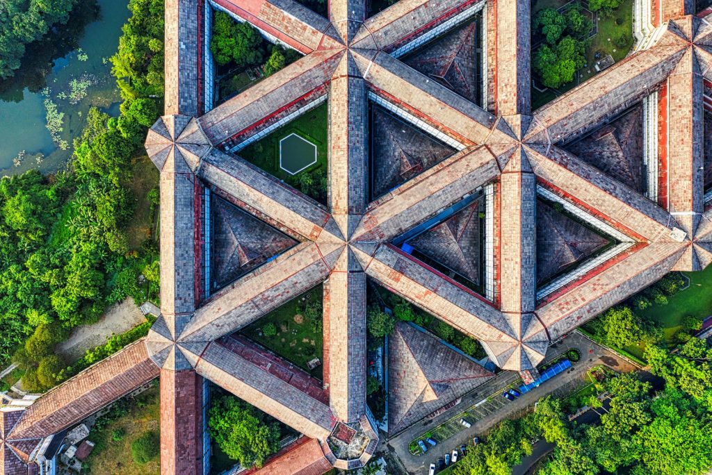 A striking aerial shot showcasing the intricate geometric design of a building in Bogor.