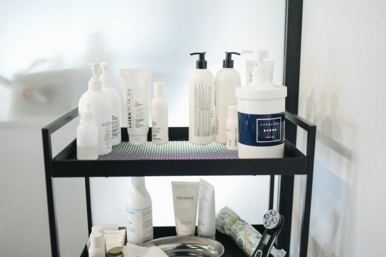 A chic arrangement of skincare products on a shelf at a beauty salon for professional use.