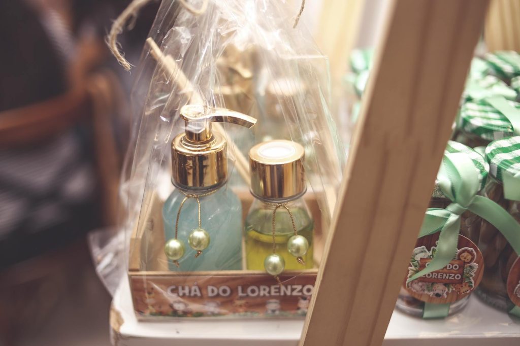 Elegant glass bottles in a gift set with gold accents, perfect for storage or decoration.