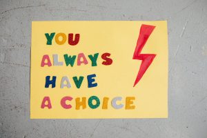 Colorful handmade poster with inspiring message 'You Always Have a Choice' and red lightning bolt.
